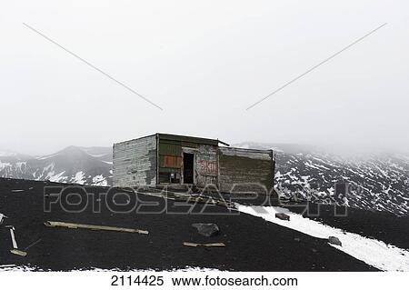 Stock Photography - A Weathered Wooden Building In Whalers Bay; Antarctica. Fotosearch
