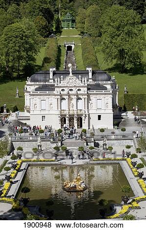 Stock Photo - A White Castle With A Pond And Gold Fountain; Linderhof, Germany. Fotosearch