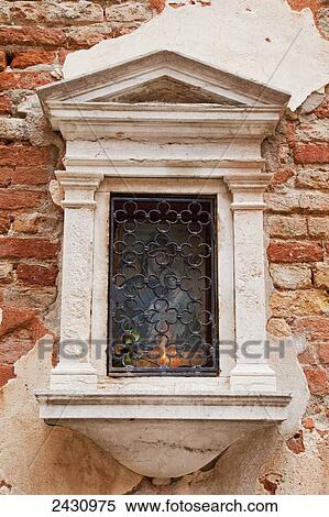 A window with ornate frame on a weathered brick wall; Venice, Italy View Large Photo Image Stock Photography - A window with ornate frame on a weathered brick wall; Venice, Italy. Fotosearch