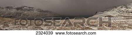 Stock Photo - A wintery look at a remote fjord; Westfjords, Iceland. Fotosearch
