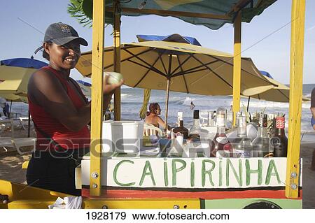 A Woman Selling Caipirinha From A Mobile Cart At A Beach, Brazil View Large Photo Image Stock Photo - A Woman Selling Caipirinha From A Mobile Cart At A Beach, Brazil. Fotosearch