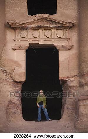A Woman Tourist Visits The Nabatean Ruins; Petra Jordan View Large Photo Image Picture - A Woman Tourist Visits The Nabatean Ruins; Petra Jordan. Fotosearch