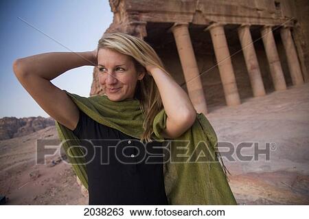 A Woman Tourist Visits The Nabatean Ruins; Petra Jordan View Large Photo Image Stock Image - A Woman Tourist Visits The Nabatean Ruins; Petra Jordan. Fotosearch