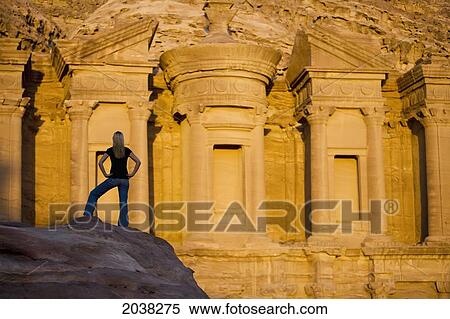 A Woman Tourist Visits The Nabatean Ruins Of The Monastery; Petra Jordan View Large Photo Image Stock Photography - A Woman Tourist Visits The Nabatean Ruins Of The Monastery; Petra Jordan. Fotosearch