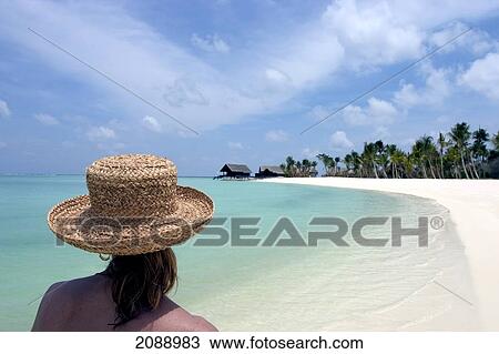 A Woman Walks On A White Sand Beach; Maldives View Large Photo Image Stock Image - A Woman Walks On A White Sand Beach; Maldives. Fotosearch