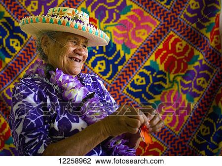 A woman weaving; Aitu Island, Cook Islands View Large Photo Image Stock Image - A woman weaving; Aitu Island, Cook Islands. Fotosearch