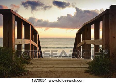A Wooden Bridge Leading To The Beach View Large Photo Image Picture - A Wooden Bridge Leading To The Beach. Fotosearch