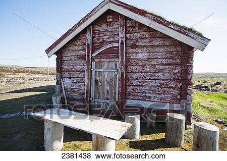 Stock Photo - A worn and weathered wooden building; Svalbard, Norway. Fotosearch