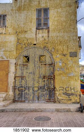A Worn Wood Door On An Old Building View Large Photo Image Stock Image - A Worn Wood Door On An Old Building. Fotosearch