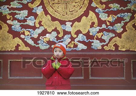 Stock Image - A Young Local Child In The Forbidden City, Beijing, China. Fotosearch