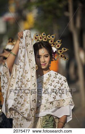 A Young Woman Dressed For The Chiang Mai Flower Festival Parade; Chiang Mai Thailand View Large Photo Image Stock Photo - A Young Woman Dressed For The Chiang Mai Flower Festival Parade; Chiang Mai Thailand. Fotosearch