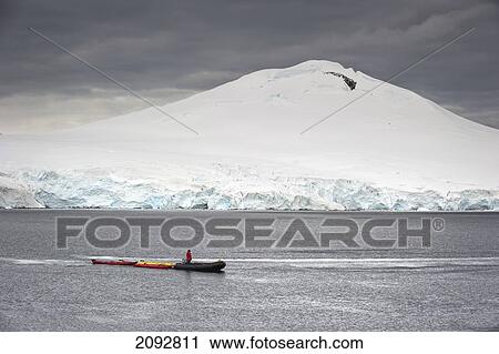 Stock Image - A Zodiac In The Water; Antarctic. Fotosearch