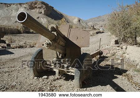 Stock Image - Abandoned Anti-Aircraft Gun In Shekh Ali, Parwan Province, Afghanistan. Fotosearch