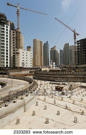 Stock Image - Abandoned Construction Site At Dubai Marina; Dubai, United Arab Emirates. Fotosearch
