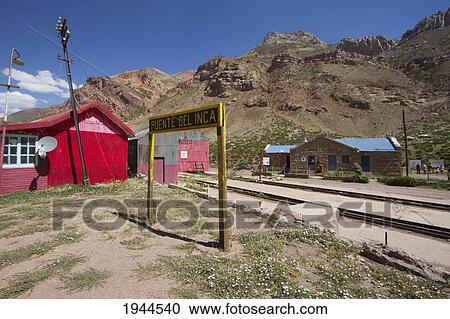 Stock Image - Abandoned tracks and station of the Ferrocarril Transandino (Transandine Railway), Puente del Inca, Mendoza, Argentina. Fotosearch