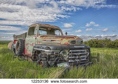 Stock Photograph - Abandoned truck in a rural area; Saskatchewan, Canada. Fotosearch