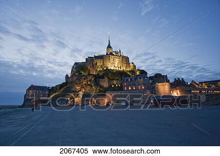 Abbey Of Mont-Saint-Michel In The Evening, As Seen From The South, France View Large Photo Image Stock Photography - Abbey Of Mont-Saint-Michel In The Evening, As Seen From The South, France. Fotosearch