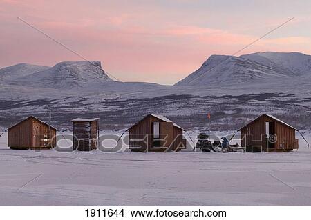 Abisko Ark Hotel Cabins With Lapporten Mountain Range In Background At Dusk, Abisko, Sweden View Large Photo Image Picture - Abisko Ark Hotel Cabins With Lapporten Mountain Range In Background At Dusk, Abisko, Sweden. Fotosearch