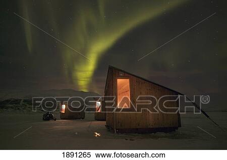 Stock Photography - Abisko, Sweden. The Abisko Ark Hotel With The Aurora Borealis (Northern Lights) In The Background. Doug Mckinlay/Axiom. Fotosearch