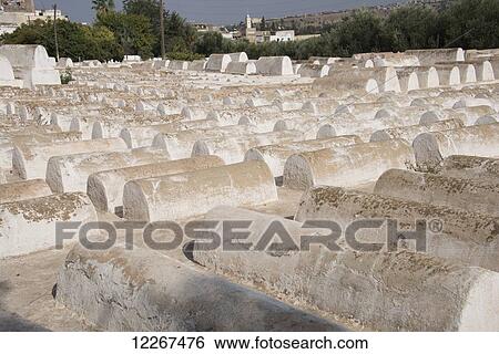 Stock Photograph - Above ground burial sites in Jewish cemetery in Jewish quarter of Fes; Fes, Morocco. Fotosearch