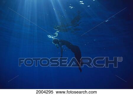 Abstract Full Length View Of Woman Evening Gown Underwater Surface And Sunrays Surreal View Large Photo Image Stock Photography - Abstract Full Length View Of Woman Evening Gown Underwater Surface And Sunrays Surreal. Fotosearch