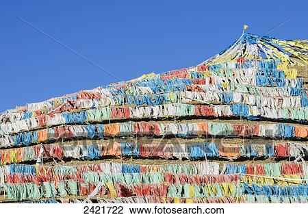 Abundance of prayer flags on a mountain slope at a Tibetan monastery near Hot Spring city at Madoi County; Tibet View Large Photo Image Stock Image - Abundance of prayer flags on a mountain slope at a Tibetan monastery near Hot Spring city at Madoi County; Tibet. Fotosearch