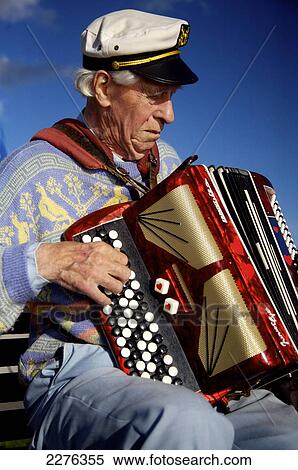 Stock Photography - Accordion player; Trosa, Sweden. Fotosearch