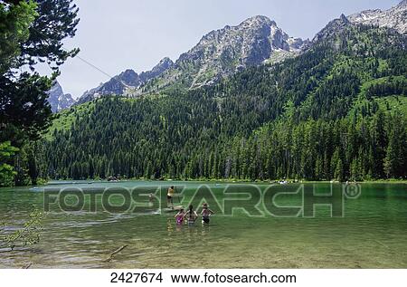 Picture - Activity on String Lake, Teton National Park; Wyoming, United States of America. Fotosearch