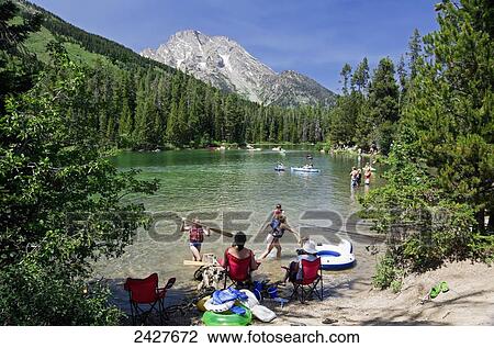 Activity on String Lake, Teton National Park; Wyoming, United States of America View Large Photo Image Stock Image - Activity on String Lake, Teton National Park; Wyoming, United States of America. Fotosearch