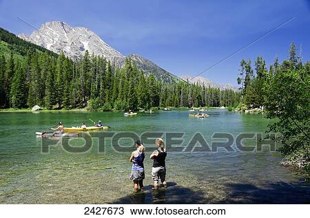 Activity on String Lake, Teton National Park; Wyoming, United States of America View Large Photo Image Stock Image - Activity on String Lake, Teton National Park; Wyoming, United States of America. Fotosearch