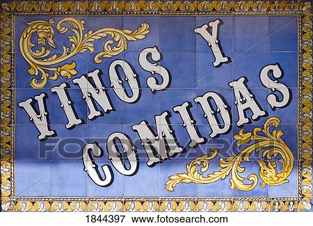 Stock Photo - Advertising Outside La Taberna De Santiago For Wine And Meals; Marbella, Malaga Province, Costa Del Sol, Spain. Fotosearch