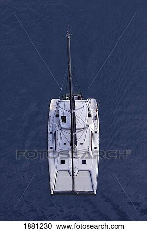 Stock Image - Aerial View Of A Catamaran In Rio Dulce; Guatemala. Fotosearch