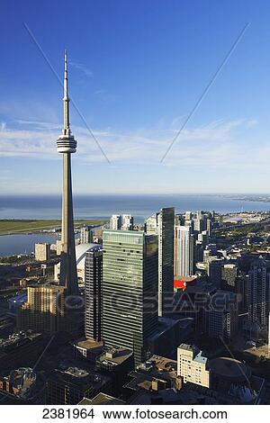 Aerial view of CN tower looking towards downtown Toronto, Island airport and Lake Ontario from First Canadian Place; Toronto, Ontario, Canada View Large Photo Image Picture - Aerial view of CN tower looking towards downtown Toronto, Island airport and Lake Ontario from First Canadian Place; Toronto, Ontario, Canada. Fotosearch