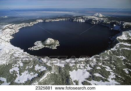 Stock Image - Aerial view of Crater Lake and Wizard Island; Oregon, United States of America. Fotosearch