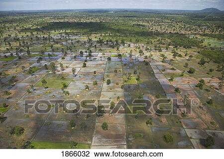 Stock Image - Aerial View Of Farm Lands In Cambodia; Siem Reap, Cambodia. Fotosearch