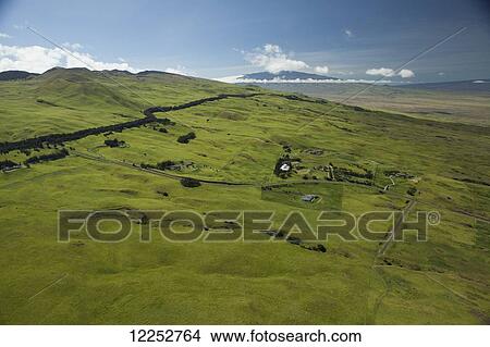 Aerial view of Kohala Ranch, Kohala Mountain and Mauna Kea in the distance; Island of Hawaii, Hawaii, United States of America View Large Photo Image Picture - Aerial view of Kohala Ranch, Kohala Mountain and Mauna Kea in the distance; Island of Hawaii, Hawaii, United States of America. Fotosearch
