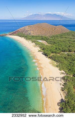 Aerial view of Makena Beach with mountains in the distance; Maui, Hawaii, United States of America View Large Photo Image Stock Image - Aerial view of Makena Beach with mountains in the distance; Maui, Hawaii, United States of America. Fotosearch