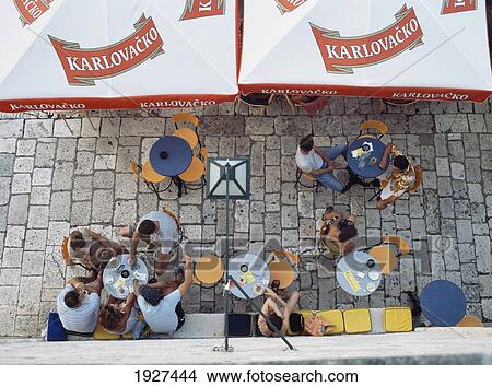 Aerial View Of People In Cafes View Large Photo Image Picture - Aerial View Of People In Cafes. Fotosearch
