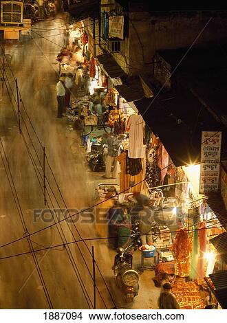 Picture - Aerial View Of People Shopping And Walking At Night, Blurred Motion. Fotosearch