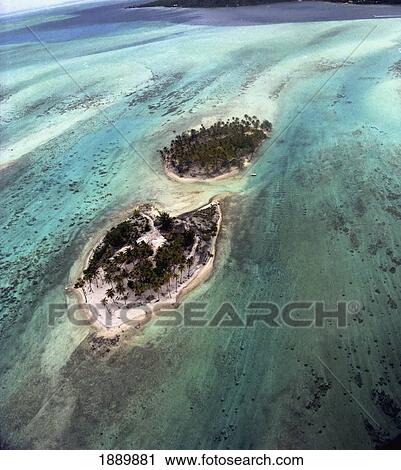 Stock Image - Aerial View Of Reef And Islands Off Coast Of Bora Bora. Fotosearch