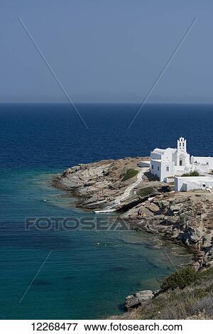 Aerial view of the Chrysopiyi Monastery surrounded by emerald seas; Sifnos, Cyclades, Greek Islands, Greece View Large Photo Image Stock Photo - Aerial view of the Chrysopiyi Monastery surrounded by emerald seas; Sifnos, Cyclades, Greek Islands, Greece. Fotosearch