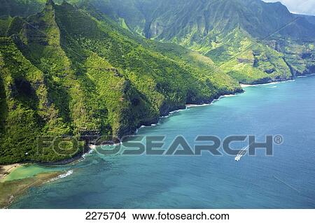Picture - Aerial view of the coastline of an hawaiian island; Na Pali coast of Kauai, Hawaii, United States of America. Fotosearch