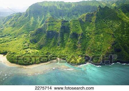 Picture - Aerial view of the coastline of an hawaiian island; Na Pali coast of Kauai, Hawaii, United States of America. Fotosearch