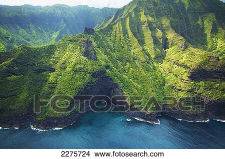 Aerial view of the coastline of an hawaiian island; Na Pali coast of Kauai, Hawaii, United States of America View Large Photo Image Picture - Aerial view of the coastline of an hawaiian island; Na Pali coast of Kauai, Hawaii, United States of America. Fotosearch