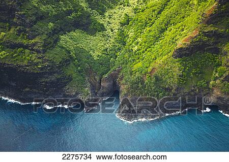 Picture - Aerial view of the coastline of an hawaiian island; Na Pali coast of Kauai, Hawaii, United States of America. Fotosearch