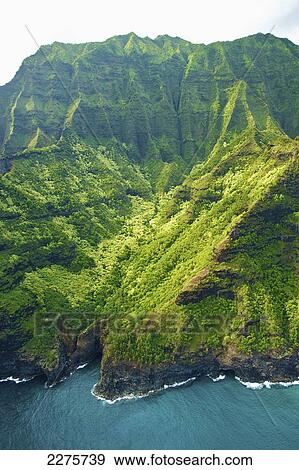 Stock Photo - Aerial view of the coastline of an hawaiian island; Na Pali coast of Kauai, Hawaii, United States of America. Fotosearch