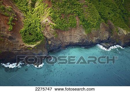 Stock Photo - Aerial view of the coastline of an hawaiian island; Na Pali coast of Kauai, Hawaii, United States of America. Fotosearch