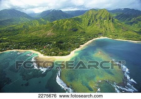 Stock Photograph - Aerial view of the coastline of an hawaiian island; Na Pali coast of Kauai, Hawaii, United States of America. Fotosearch