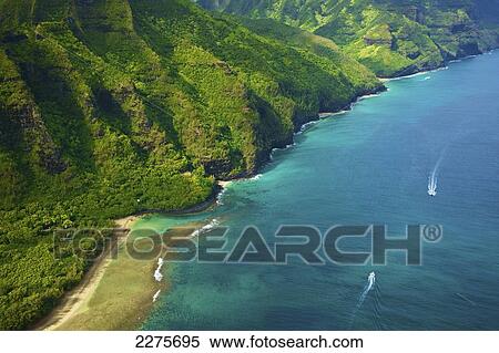 Stock Photography - Aerial view of the coastline of an hawaiian island; Na Pali coast of Kauai, Hawaii, United States of America. Fotosearch