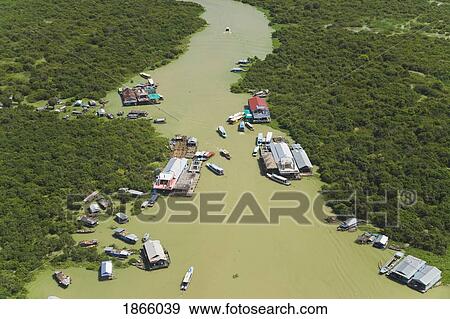 Stock Photo - Aerial View Of The Floating Village Of Chong Kneas Bordering The Tonle Sap Lake In Cambodia. Fotosearch